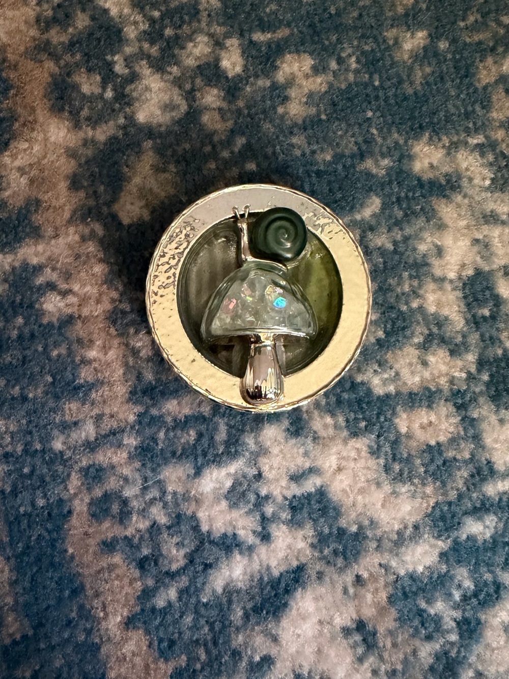 Silver Mushroom Bath and Body Works car freshener with Green Snail Accent